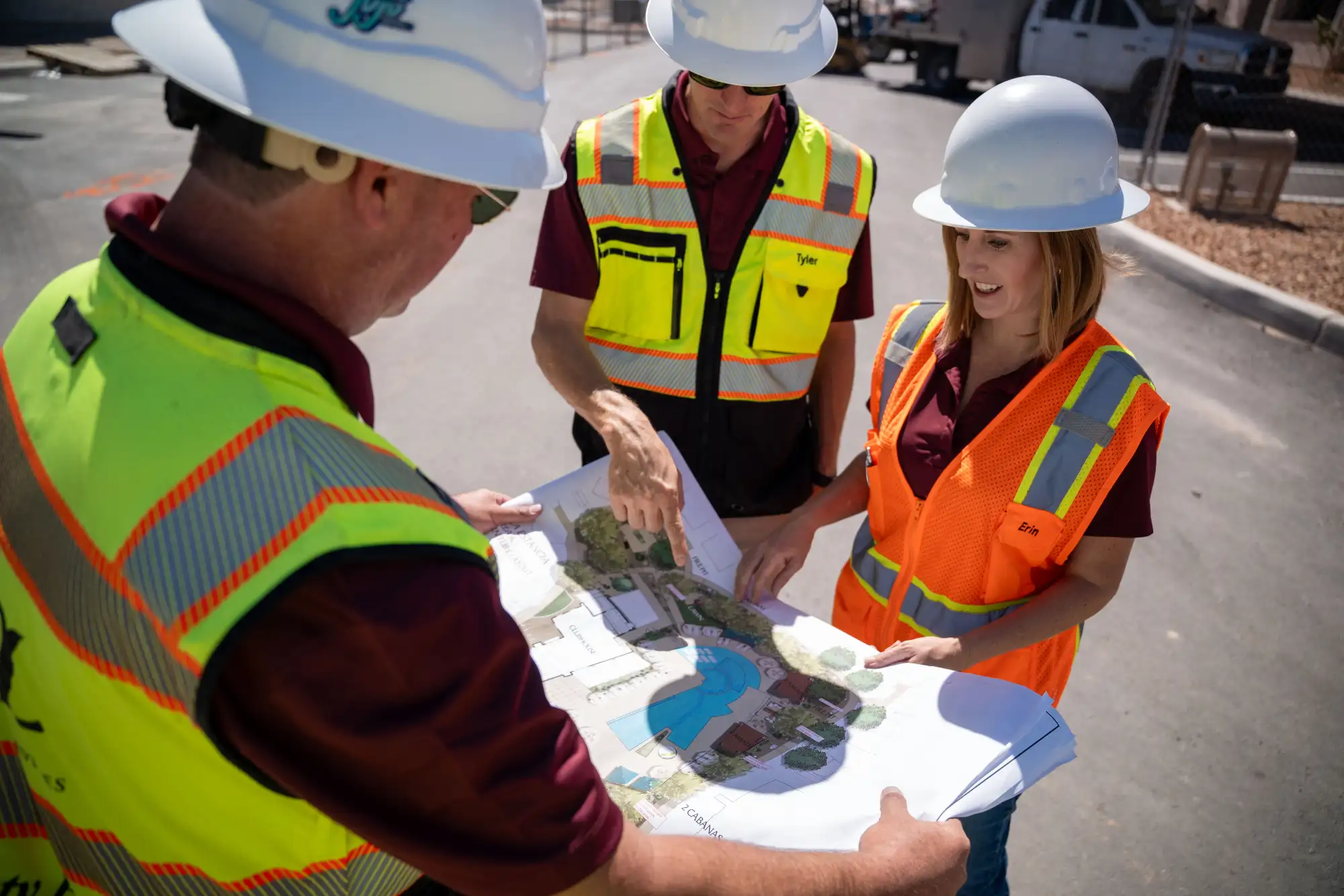 HSL Construction Services team reviewing a blueprint.